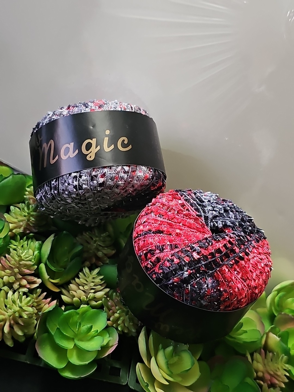 Magic Karabella Bouclé Yarn in Black, Red, and Gray with Metallic Accent